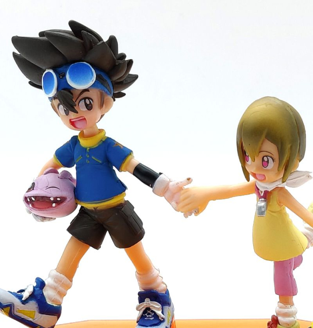 Figura de Taichi y Hikari...